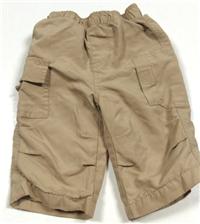 Béžové šusťákové oteplené kalhoty s kapsami 