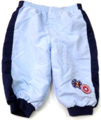Modré šusťákové oteplené kalhoty s výšivkou 