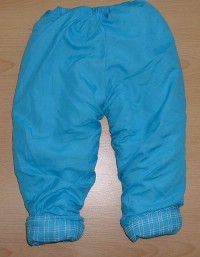 Tyrkysové šusťákové zateplené kalhoty