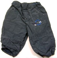Šedé plátěné oteplené kalhoty s číslem zn. TU