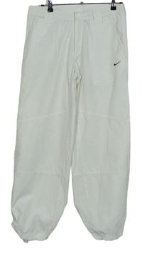 Dámské bílé šusťákové outdoorové kalhoty zn. Nike 