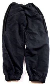Antracitové sportovní kalhoty s pruhy zn. Adidas