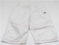 Bílé šusťákové 3/4 kalhoty s logem zn. Nike 