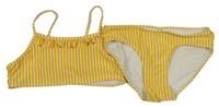 Žluto-bílé pruhované dvoudílné plavky s volánky zn. H&M