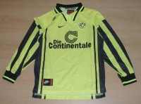 Žluto-černý dres s nápisem a nášivkou a výšivkou a límečkem zn. Nike vel. 152/164 cm