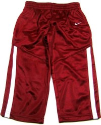 Outlet - Vínové sportovní kalhoty s proužky zn. Nike