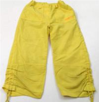 Žluté 7/8 šusťákové kalhoty zn. Girl2Girl 