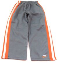 Šedo-oranžovo-bílé teplejší kalhoty s logem zn. Nike