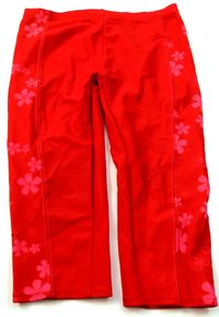 Červené 3/4 UV kalhoty s kytičkami 