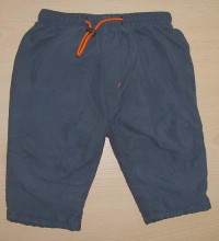 Tmavomodré šusťákové kalhoty s podšívkou zn. C&A