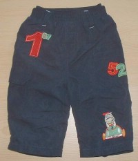 Modré šusťákové oteplené kalhoty s nášivkami zn. Tiny Ted