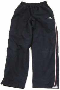 Tmavomodré šusťákové oteplené kalhoty s nápisem zn. Diadora vel.  14 let