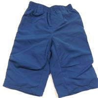 Námořnicky modré šusťákové oteplené kalhoty zn.Tiny ted