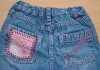 Modré riflové kalhoty s růžovým manžestrem zn. Marks&Spencer