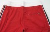 Outlet - Dámské červené šusťákové sportovní kalhoty