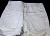 Béžové plátěné kalhoty s flitry vel. 146 cm