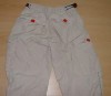 Béžové šusťákové kalhoty s nápisem zn. H&M vel. 134