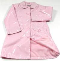 Růžový pogumovaný jarní kabátek 