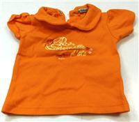 Oranžové tričko s potiskem a límečkem 