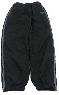 Černé šusťákové kalhoty s pruhem zn. Lonsdale