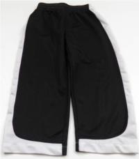 Černo-bílo-šedé sportovní kalhoty 