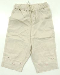 Béžové lněné kalhoty s kytičkami zn. H&M