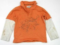 Oranžovo-béžové triko s nápisem a límečkem