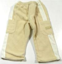 Béžovo-bílé fleecové oteplené kapsové kalhoty zn. Disney 