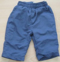 Modré šusťákové oteplené kalhoty s kapsou zn. Tiny Ted