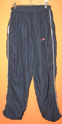 Pánské tmavomodré šusťákové kalhoty s podšívkou zn. Nike