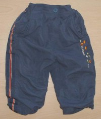 Tmavomodré šusťákové kalhoty s pruhy a podšívkou