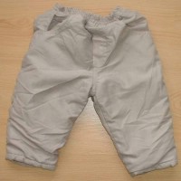 Béžové šusťákové zateplené kalhoty
