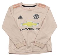 Světlerůžový fotbalový funkční dres -  Manchester United  zn. Adidas