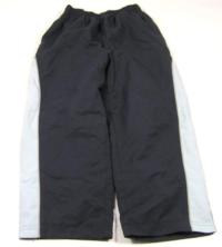 Tmavomodré šusťákové kalhoty zn.Cherokee