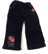 Tmavomodré sametovo/riflové kalhoty s kytičkami 