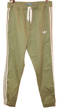 Pánské zelené plátěné kalhoty pruhy zn. Adidas