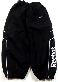 Černé šusťákové cuff kalhoty s nápisem zn.Reebok