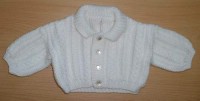 Bílý propínací pletený svetr