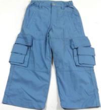 Modré šusťákové kalhoty s kapsami 