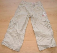 Béžové plátěné oteplené kalhoty s kytičkami zn. Geogre