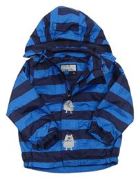 Tmavomodro-modrá pruhovaná šusťáková jarní bunda s příšerkami a kapucí zn. Pocopiano