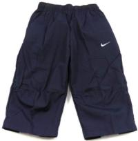 Outlet - Tmavomodré 3/4 plátěné kalhoty zn. Nike 