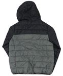 Černo-šedá šusťáková  prošívaná zateplená bunda s kapucí + sáček na sbalení zn. Primark