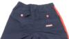 Tmavomodré šusťákové oteplené kalhoty s drakem zn.Marks&Spencer -nové