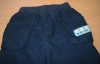Tmavomodré šusťákové oteplené kalhoty zn. Mini Mode