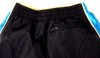 Outlet - Tmavomodré šusťákové sportovní oteplené kalhoty zn. Nike