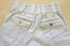 Béžové plátěné kalhoty s falešným páskem zn. Adams