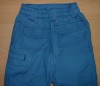 Modré šusťákové kalhoty s kapsičkou zn. Marks&Spencer